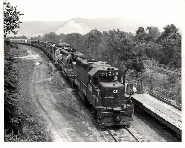 Photograph of GP38-2 7745, SD45 6077 and eight more units entering Enola Yard. 7/10/77