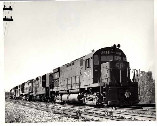 Photograph of C424 2438, GP9 7033 and more units entering Conway Yard. 5/16/77