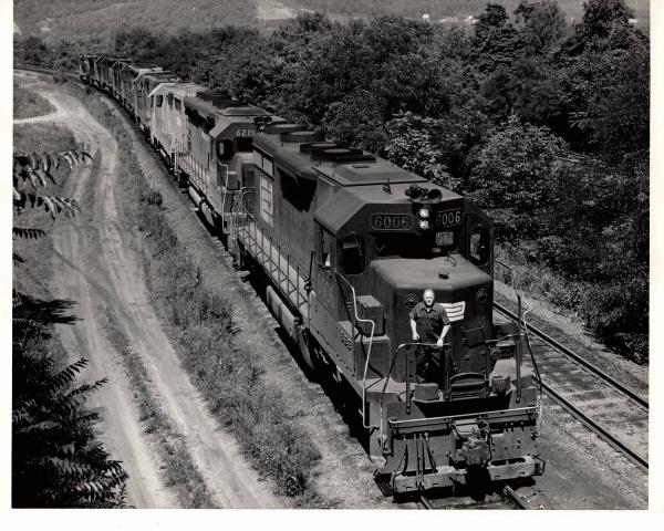 Photograph of SD35 6006, SD45 6219 and a number of other units entering Enola Yard. 7/76