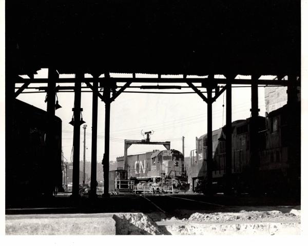 Photograph of leased CN C630 2333 and GP9 7256 at the Mingo Jct engine house. 5/14/77