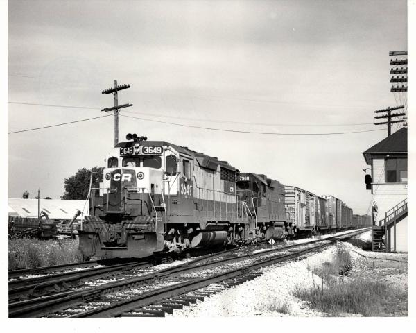 Photograph of GP35 3649 and GP38-2 7968 on train CM96 at Sterling OH. 7/24/77