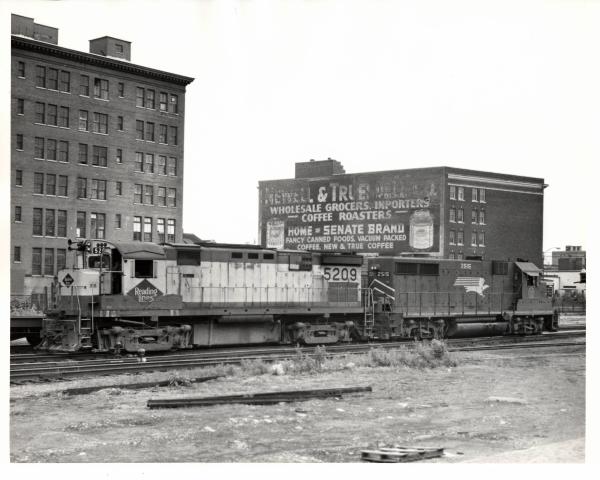 Photograph of C424 5209 and leased Missouri Pacific GP35 at Binghamton NY. 7/3/76