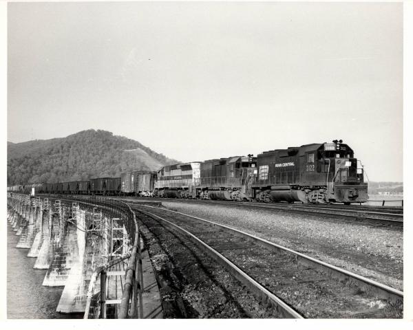Photograph of GP40 3122, GP40 3056 and SD45 3612 on Rockville Bridge. 5/76