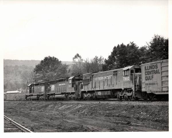 Photograph of an unknown SD40, SD45 6222, and SP U30C 7902 eastbound at Marysville PA. 11/2/76