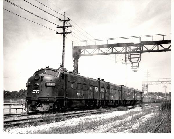 Photograph of F7 1878, F7B 3873 and two more F units on a freight out of Collinwood Yard in Cleveland OH. 7/25/76