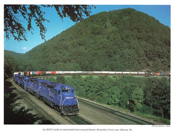 Promotional photo: An SD45-2 pulls an intermodal train around historic Horseshoe Curve near Altoona, Pa.