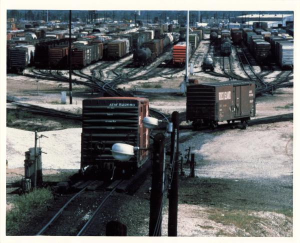 ATSF boxcar going down hump, location unknown