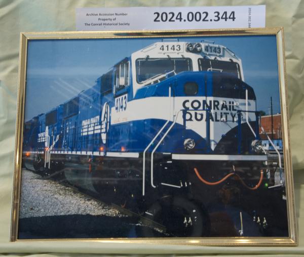 Framed color photo of Conrail Quality locomotive #4143