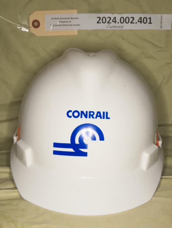 Hard hat, white with blue CR logo and orange reflector tape; unused