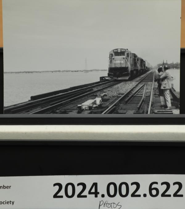 Black & white photo locomotive B36-7 #5011 crossing Bridge 248, Danbury CN