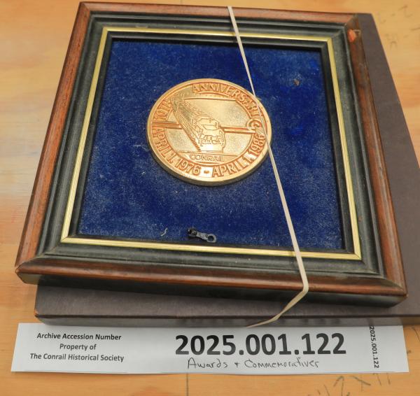 Conrail 10th anniversary awards, 1 boxed, 1 unboxed