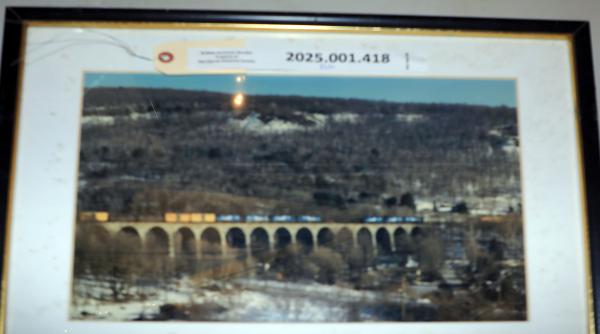 Framed color photo of merchandise train on Starucca Viaduct 1987