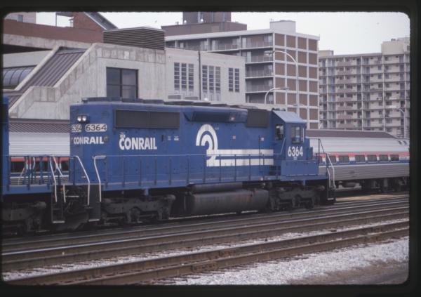 CR 6364 passing an Amtrak train in Altoona, PA