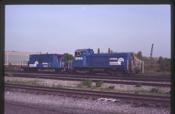 Photo of EMD SW8N6A Class Caboose 8994, 18142 in Cleveland, OH on 6/13/1980