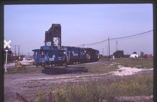 Photo of EMD GP7N5 Class Caboose 19355R, 5842, 7300 in Cleveland, OH on 6/13/1980