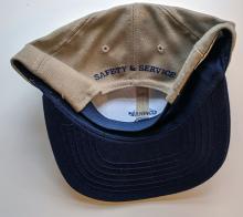 Tan Conrail hat with lettering Safety and Service