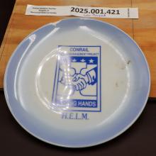 Serving plate bearing CR Labor/Mgmnt Project Joining Hands logo H.E.L.M.